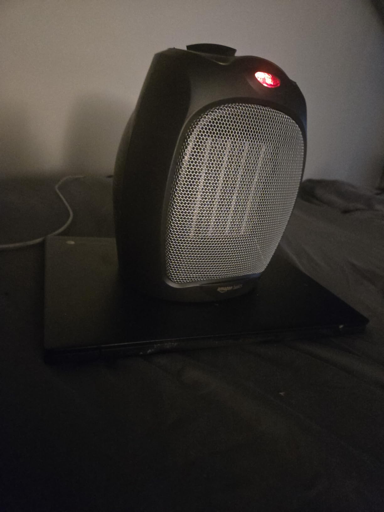 Amazon Basics Ceramic Space Heater, Portable Indoor Heating Solution, With Overheat and Tip-Over Protection, Thermostat, Non-Oscillating, 1500W, 7.52