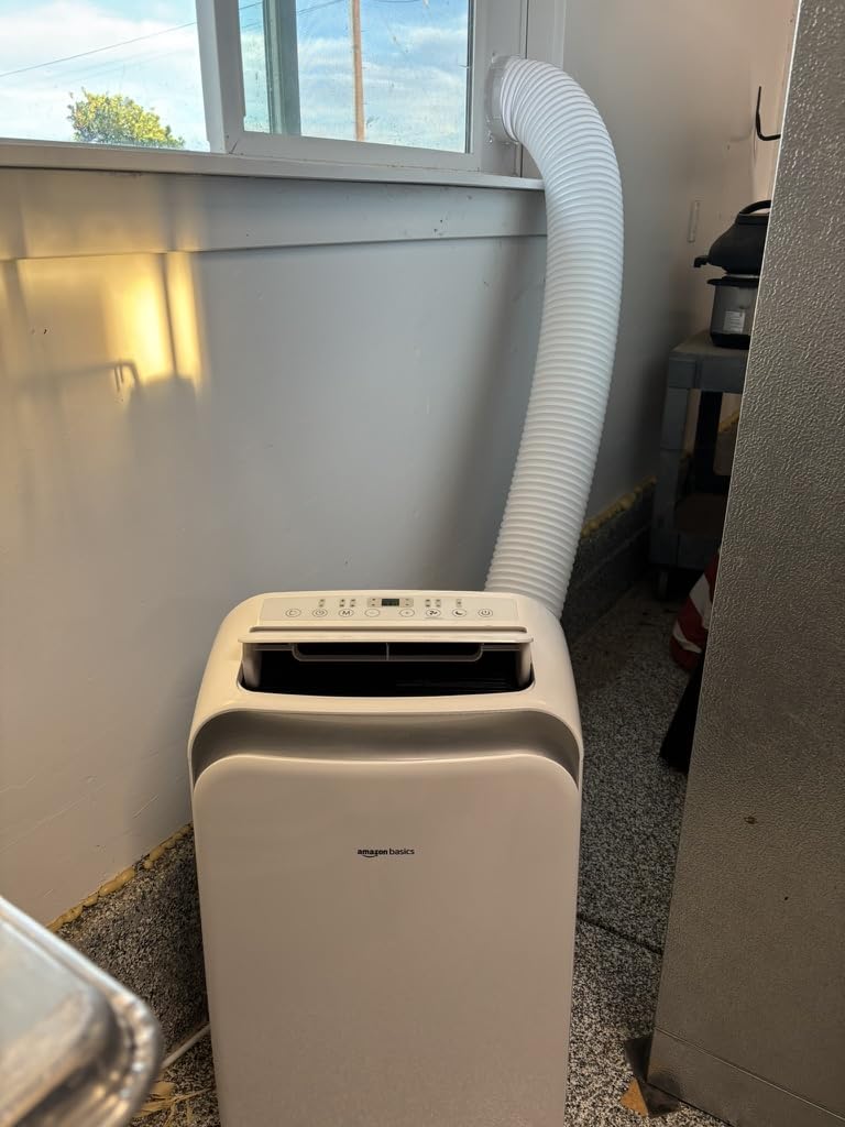 Amazon Basics 4-In-1 Portable Air Conditioner with Remote, Timer, Sleep Mode, Auto Swing, Cool/Heat/Dry/Fan-Only Functions, 13500 BTU (ASHRAE), Cools Up to 550 Sqf, Energy Saving, White customer photo 1