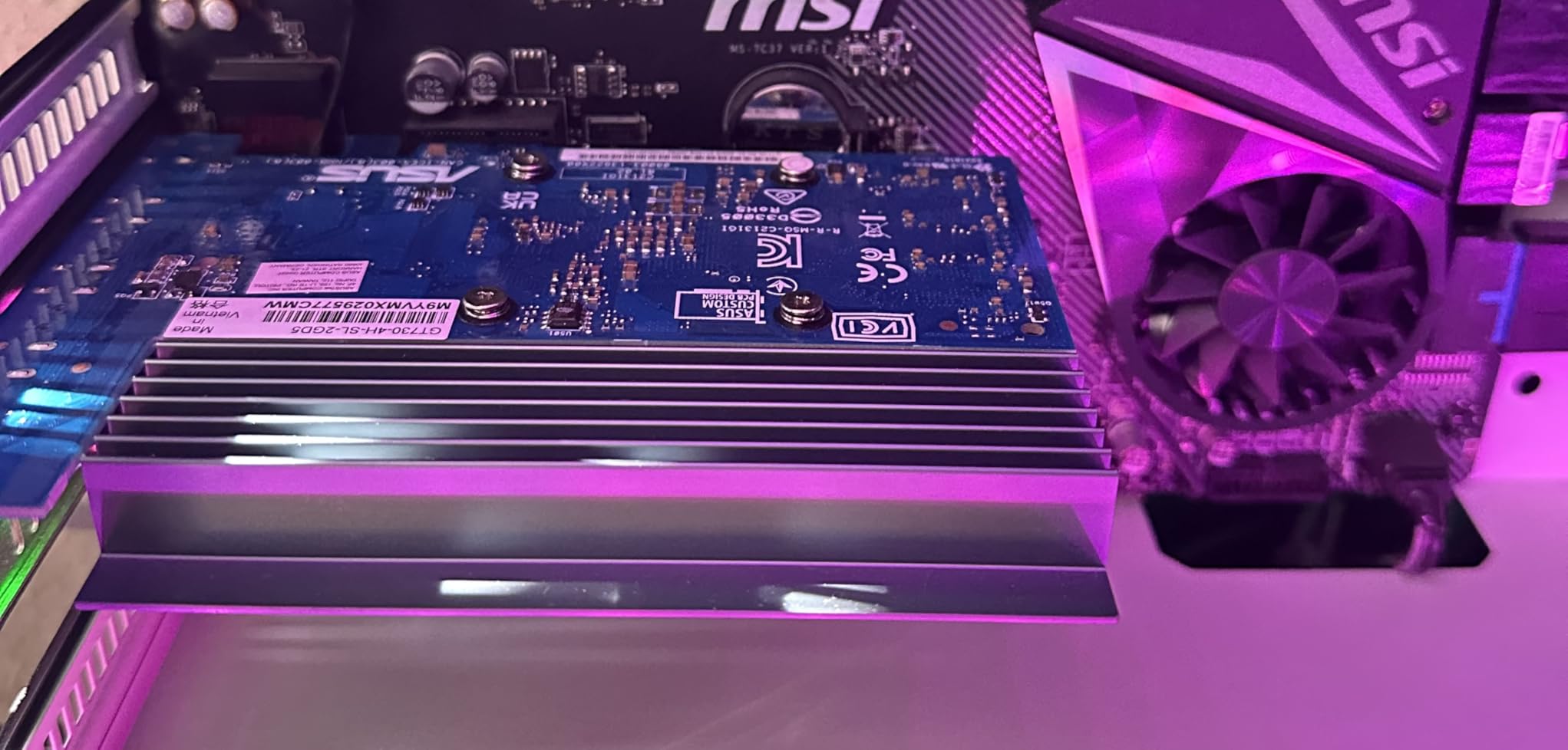 ASUS NVIDIA GeForce GT 730 Graphics Card (PCIe 2.0, 2GB GDDR5 Memory, 4X HDMI Ports, Single-Slot Design, Passive Cooling) customer photo 1