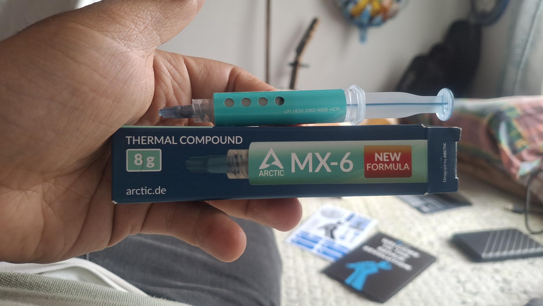 ARCTIC MX-6 (8 g) - Ultimate Performance Thermal Paste for CPU, Consoles, Graphics Cards, Laptops, Very high Thermal Conductivity, Long Durability, Non-Conductive customer photo 2
