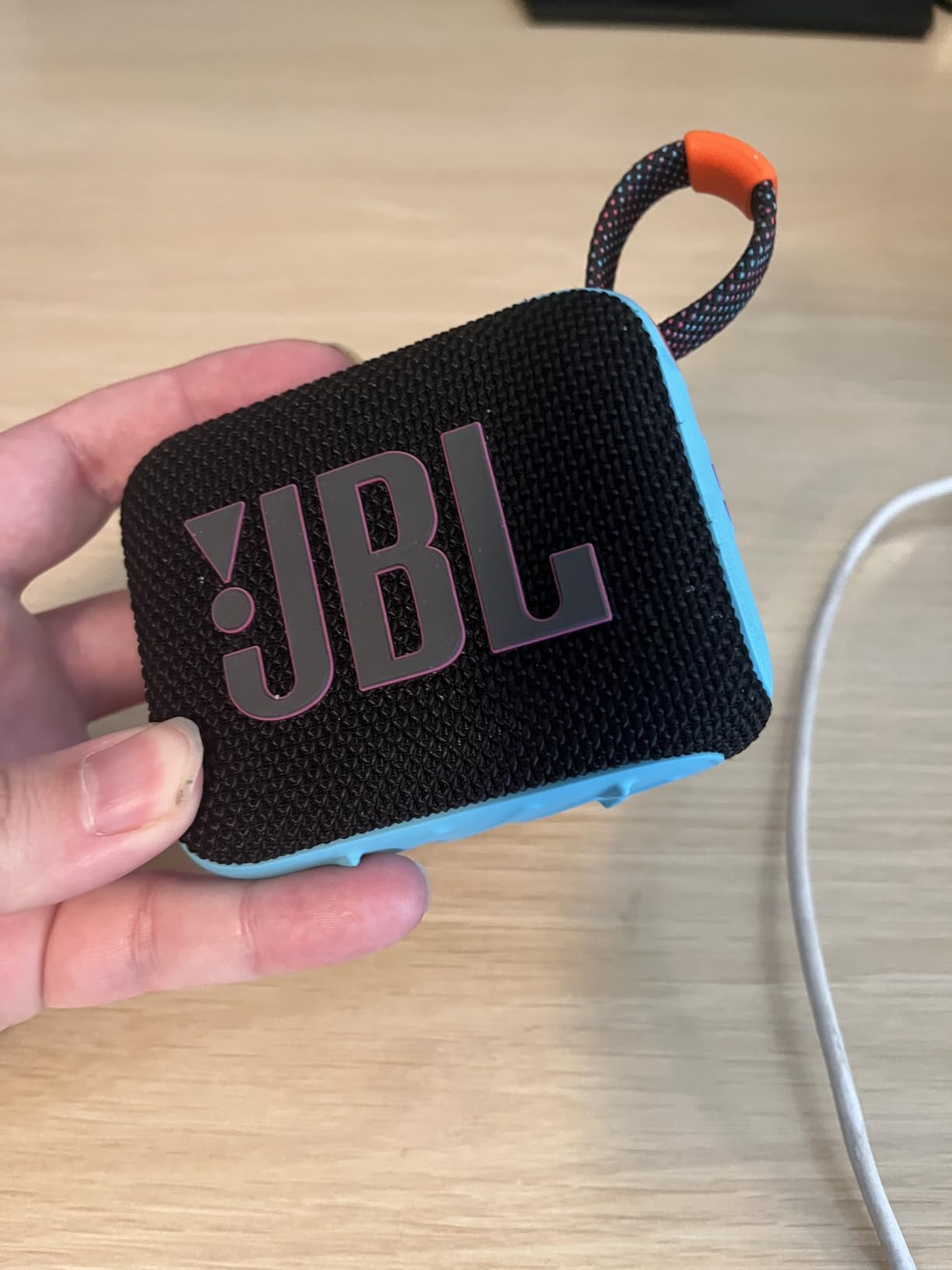 JBL Go 4 - Ultra-Portable, Waterproof and Dustproof Bluetooth Speaker, Big JBL Pro Sound with Punchy bass, 7-Hour Built-in Battery, Made in Part with Recycled Materials (Blue) customer photo 1