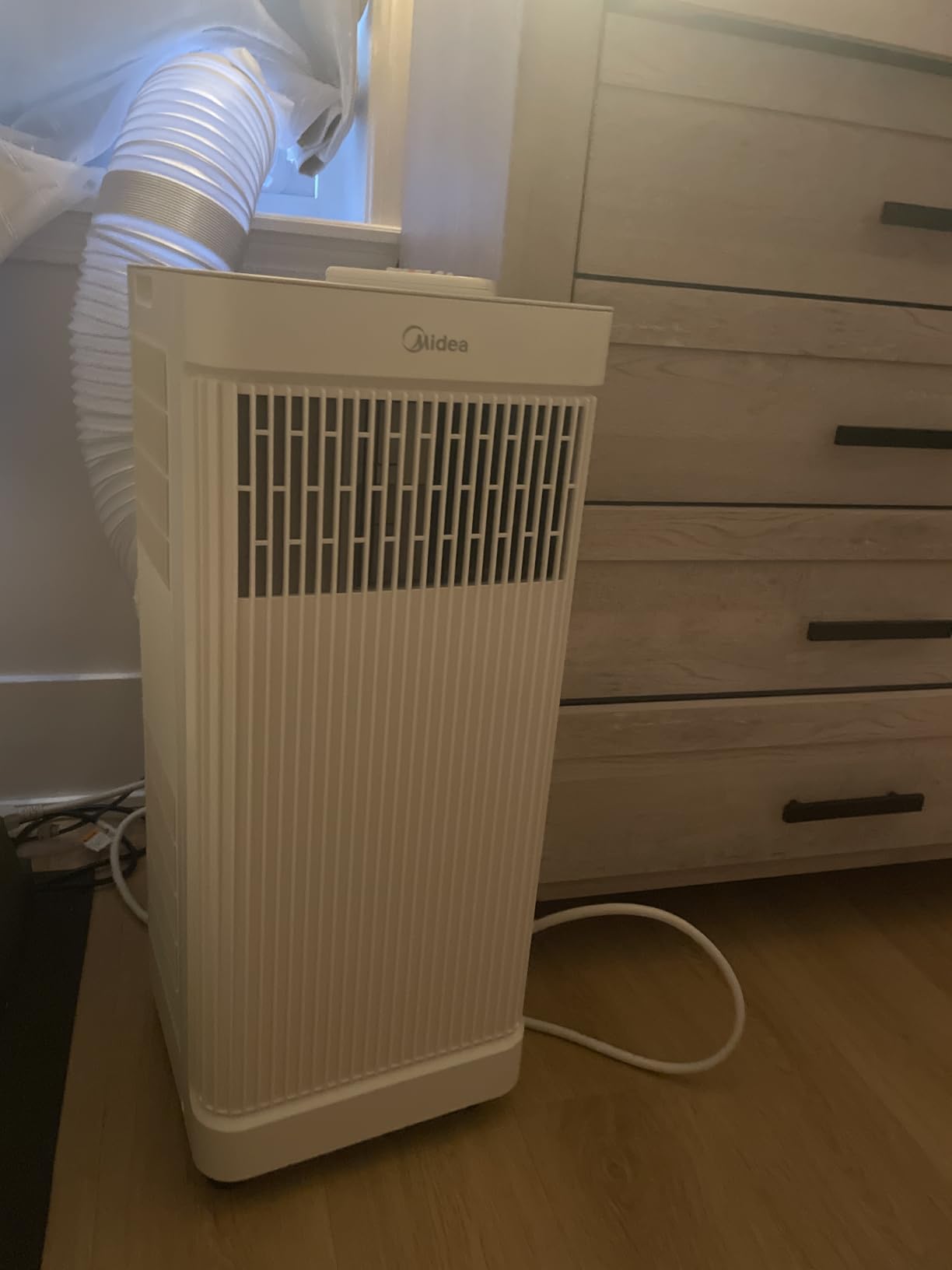 8,500 BTU ASHRAE (5,000 BTU SACC) Portable Air Conditioner, Smart Control, Cools up to 150 Sq. Ft., with Dehumidifier & Fan mode, Easy- to-use Remote Control & Window Installation Kit Included customer photo 1