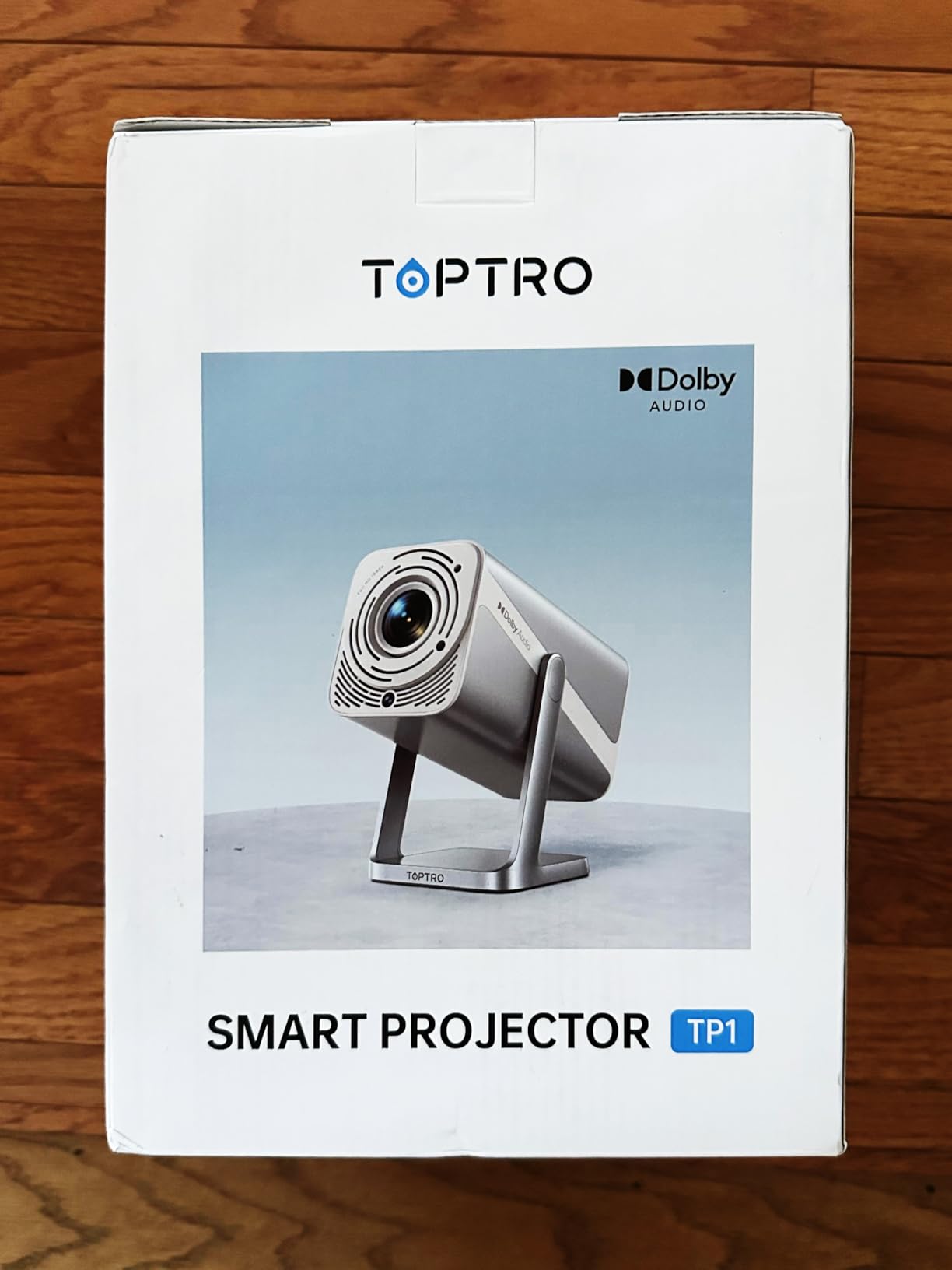 Smart Projector [Built-in Apps/4K Support/2026 Upgraded] with WiFi and Bluetooth, Native 1080P Outdoor Movie Projector, Auto Focus, Dolby Audio, TOPTRO Mini Portable Proyector w/ YouTube/Prime Video customer photo 1