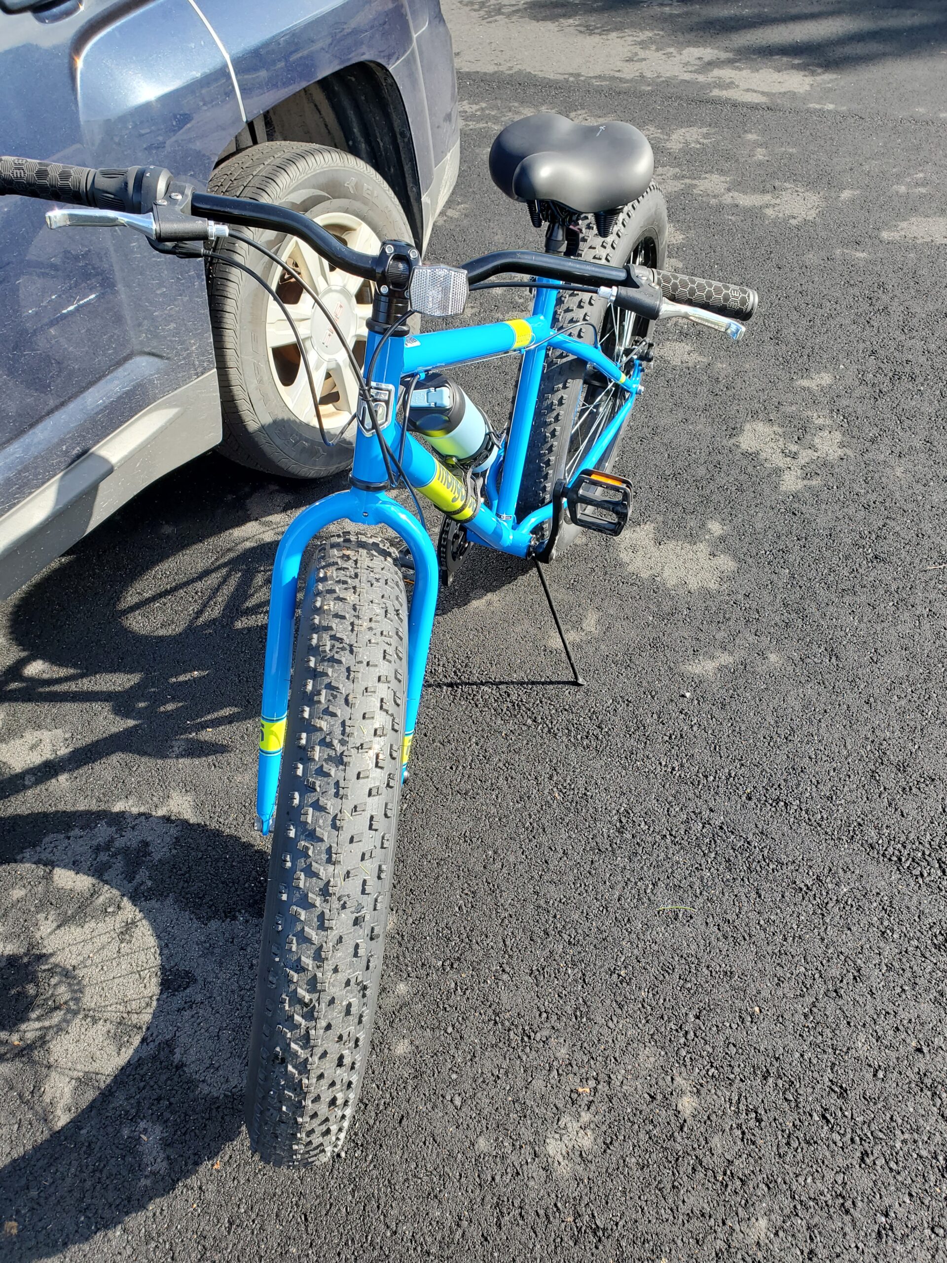 Mongoose Dolomite Fat Tire Mountain Bike, for Men and Women, 26 Inch Wheels, 4 Inch Wide Knobby Tires, 7-Speed, Adult Steel Frame, Front and Rear Brakes, Light Blue customer photo 1