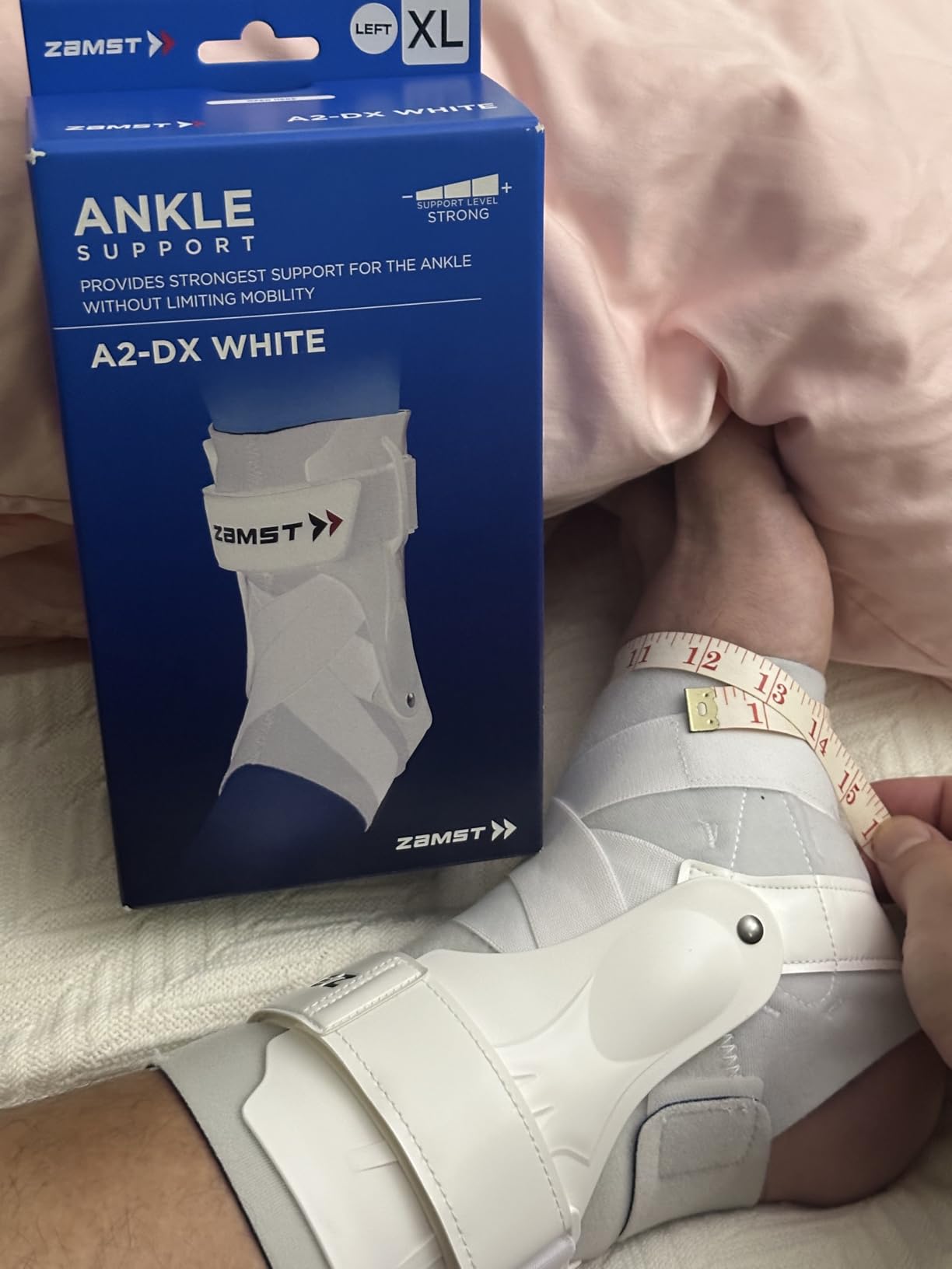 Zamst A2-DX Sports Ankle Brace with Protective Guards For High Ankle Sprains and Chronic Ankle Instability - for Basketball, Volleyball, Lacrosse, Football - Black, Left Large customer photo 1