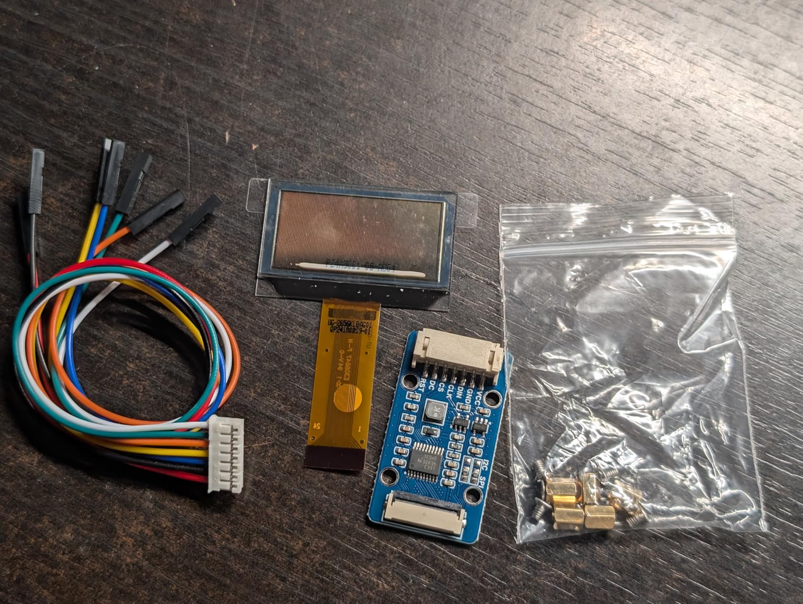 1.51inch Transparent OLED Compatible with Raspberry Pi 5/4B/3B+/3B/A+/Pi Zero W/Pi Zero 2W, 128 x 64 Resolution, SPI/I2C Interfaces, Embedded Independent Driver Chip, Light Blue Color Display customer photo 1