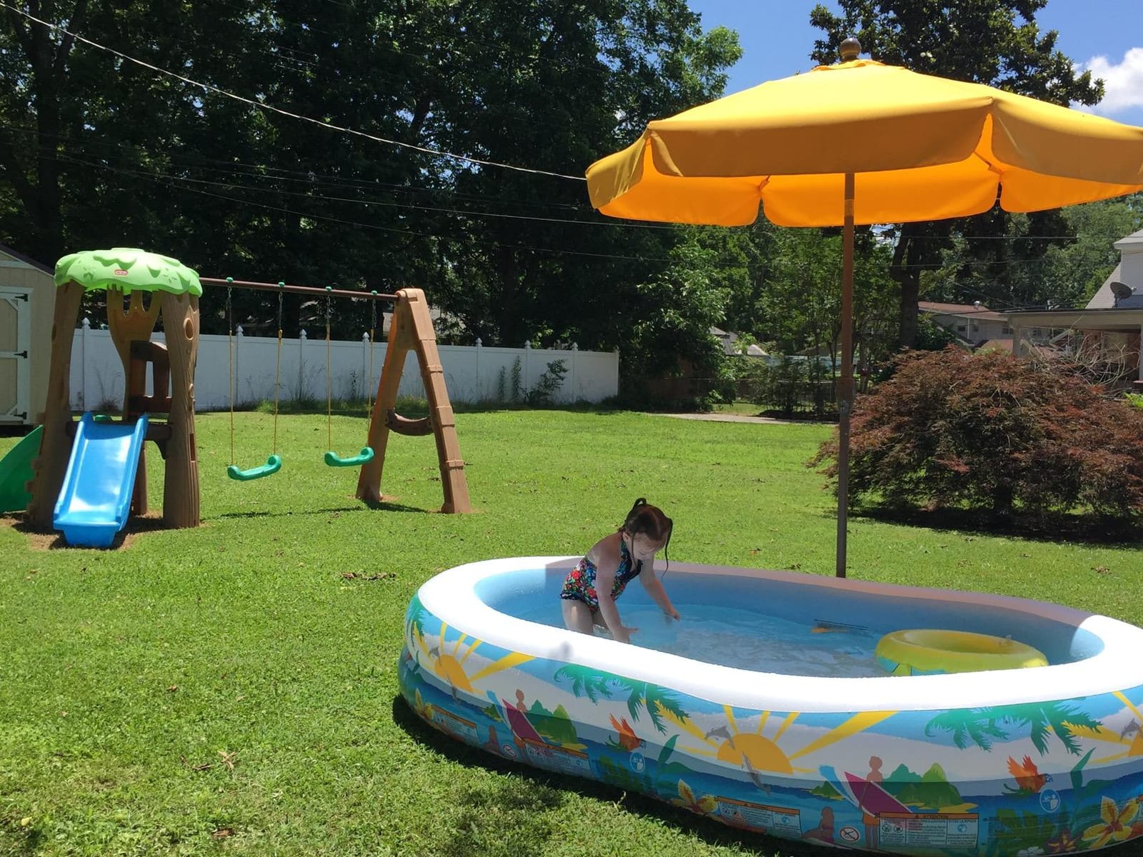 Intex 8.5ft x 5.25ft x 18in Swim Center Paradise Seaside Inflatable Kiddie Pool with Drain Plug for Quick and Easy Clean Up customer photo 1