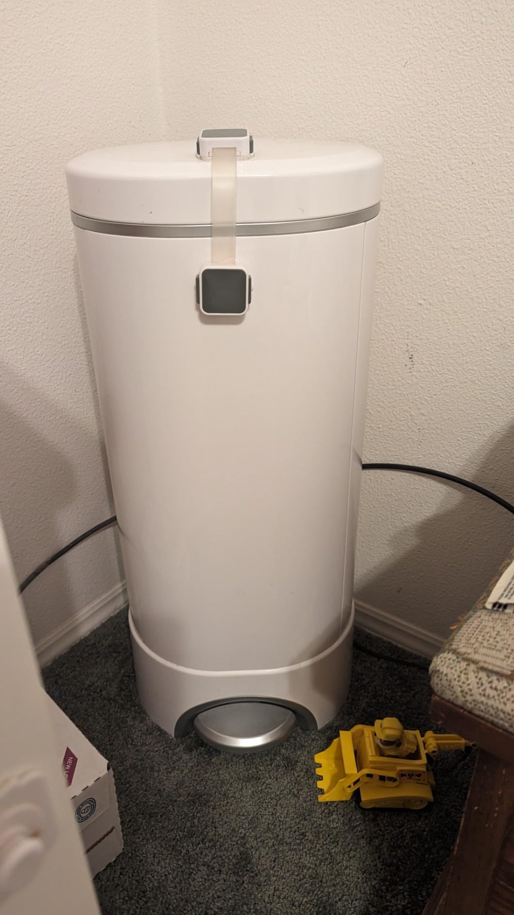 Munchkin® STEP™ Diaper Pail Powered by Arm & Hammer, #1 in Odor Control, Award-Winning, Includes 1 Snap, Seal & Toss™ Bag, 1 Starter Refill Ring, and 1 PUCK™ Baking Soda Cartridge customer photo 1