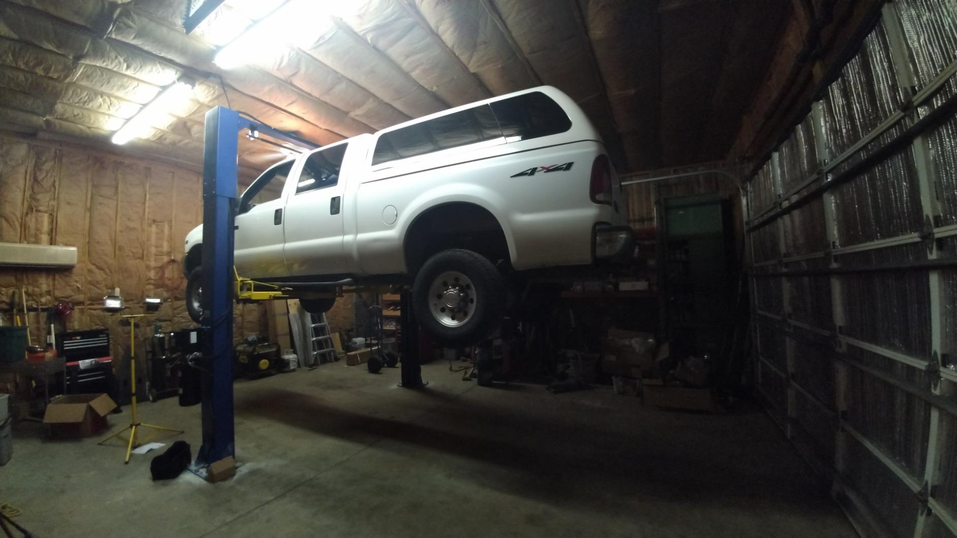 APlusLift HW-10KOH-A 10000LB Two Post Overhead Car Lift 3 Year Warranty | 3 Year Parts Replacement (A $499 Value) Rigid Double S Columns. Carriage Stronger Commercial-grade Steel. Clear Floor Design. customer photo 1