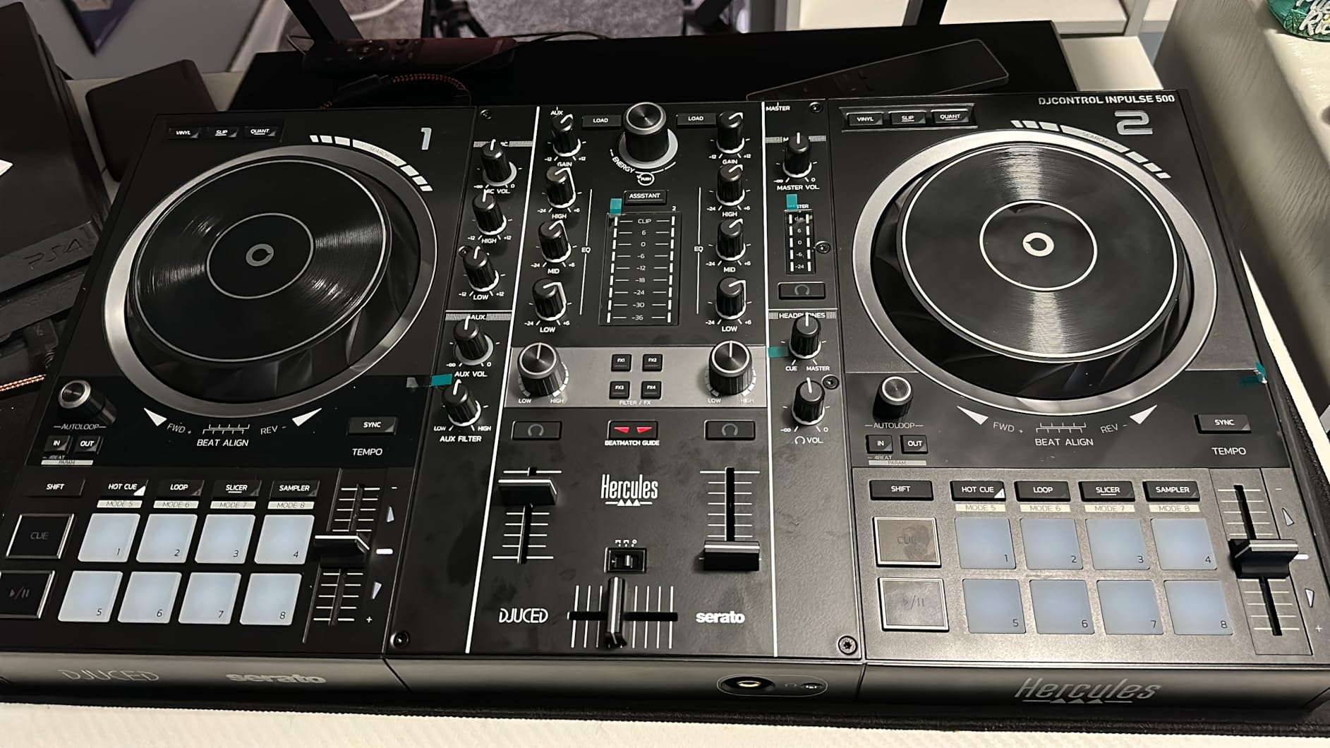 Hercules DJControl Inpulse 500-2-Deck DJ Controller for Serato & DJUCED | 2-deck DJ controller for Serato & DJUCED featuring fold-out feet, metal backing plate, Beatmatch Guide & built-in audio customer photo 1