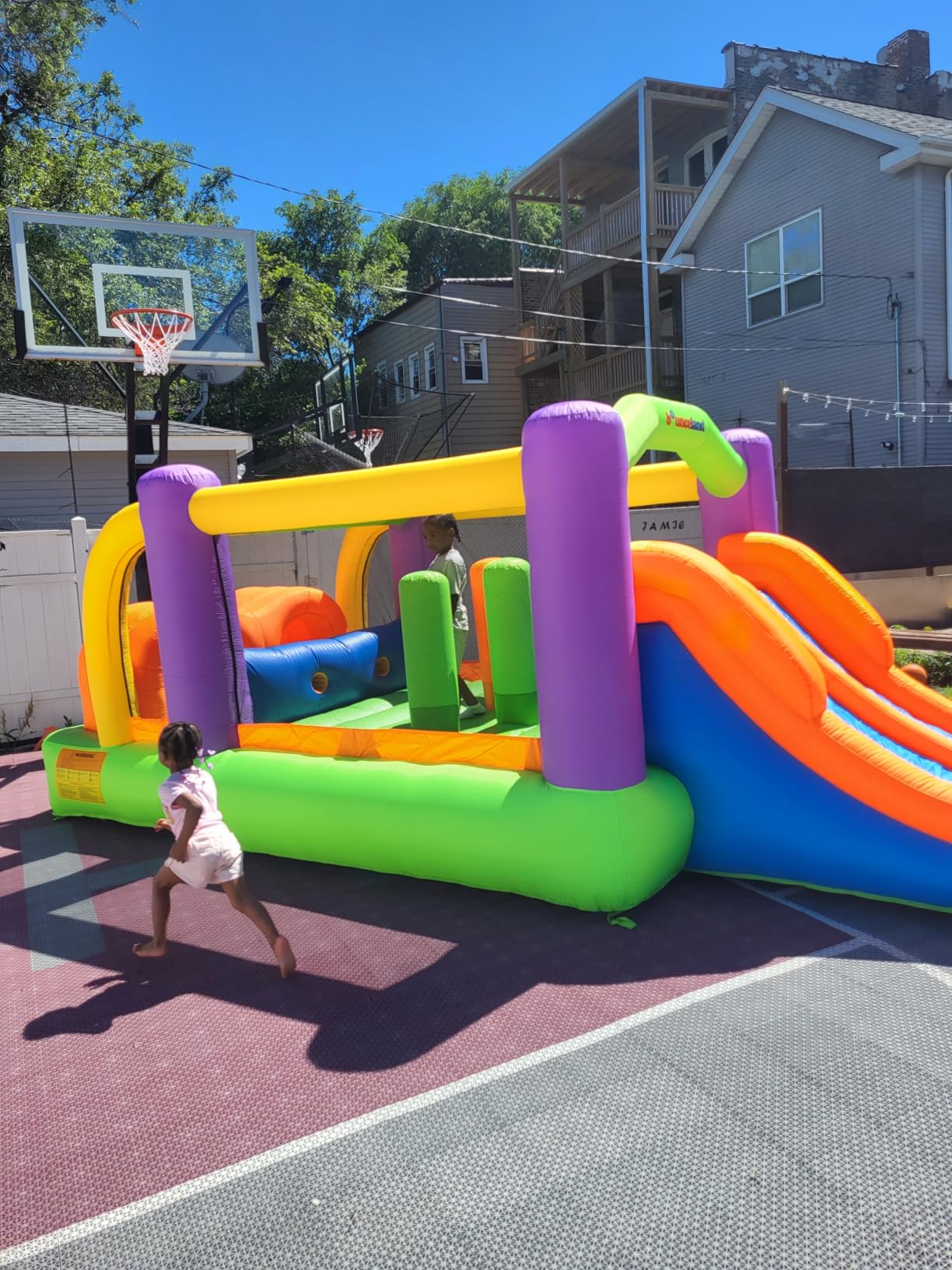 Bounceland Pro Racer Obstacle Bounce House with Dual Slides, Bounce, Climb, Slide All in One, UL 1 HP Blower Included, 19 ft x 9 ft x 7 ft H, Great for Big Party, Fun Racing Game in Teams customer photo 1