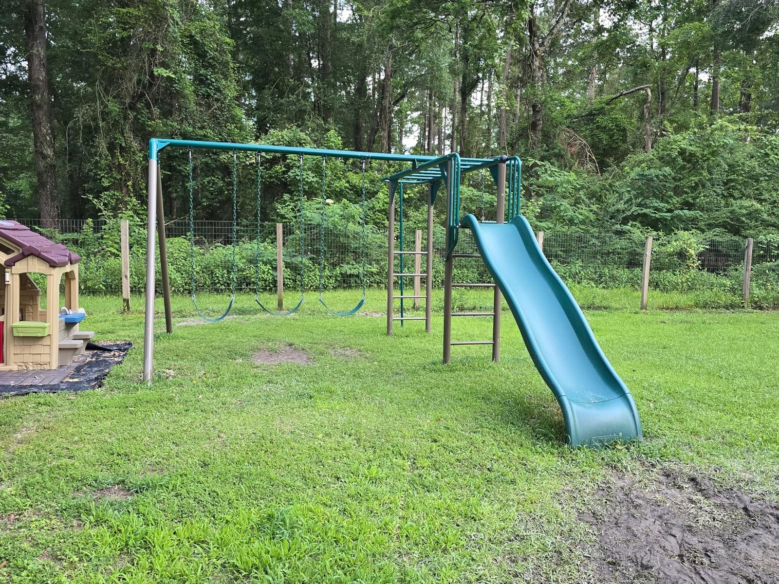 Lifetime 91028 Monkey Bar Adventure Swing Set with 3 Swings, Trapeze Bar, 9-Foot Slide and Fireman's Pole, Earthtone customer photo 2