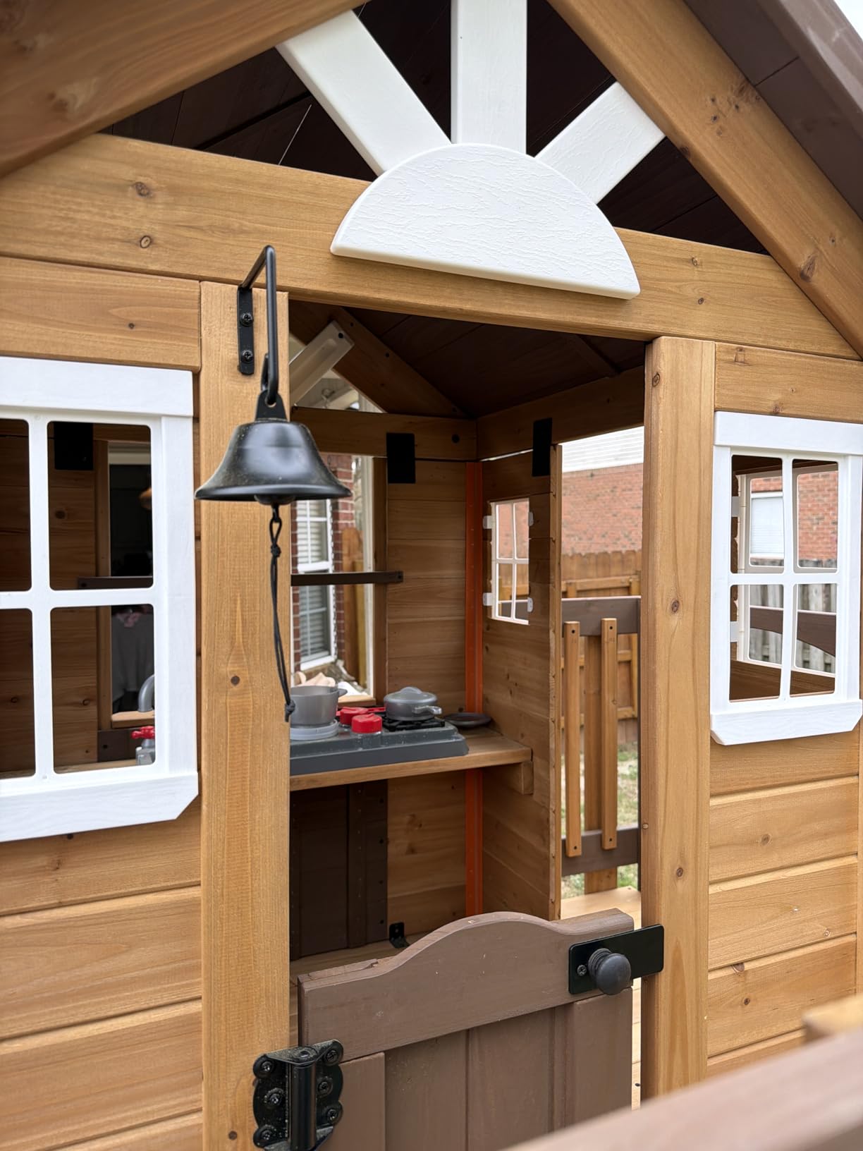 Backyard Discovery Sweetwater Heights White Elevated Cedar Wooden Kids Playhouse with Wave Slide, Play Kitchen, Step Ladder, Half Door, Wrap-Around Deck, Windows, Bell, Growth Chart for Outdoor Play customer photo 1