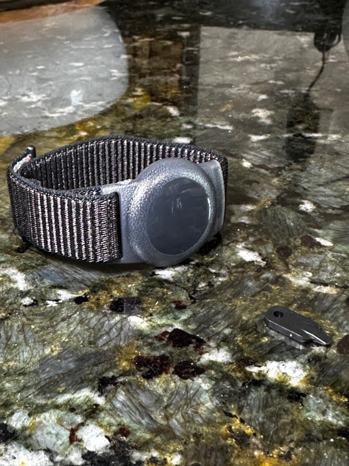 GPS Tracker for Kids (iOS only), Teen, Special Needs, and Elderly - Real-Time Mini Locator Watch Band with No Monthly Fee - Hidden Tracking Device for iOS - Works with Apple Find My customer photo 1
