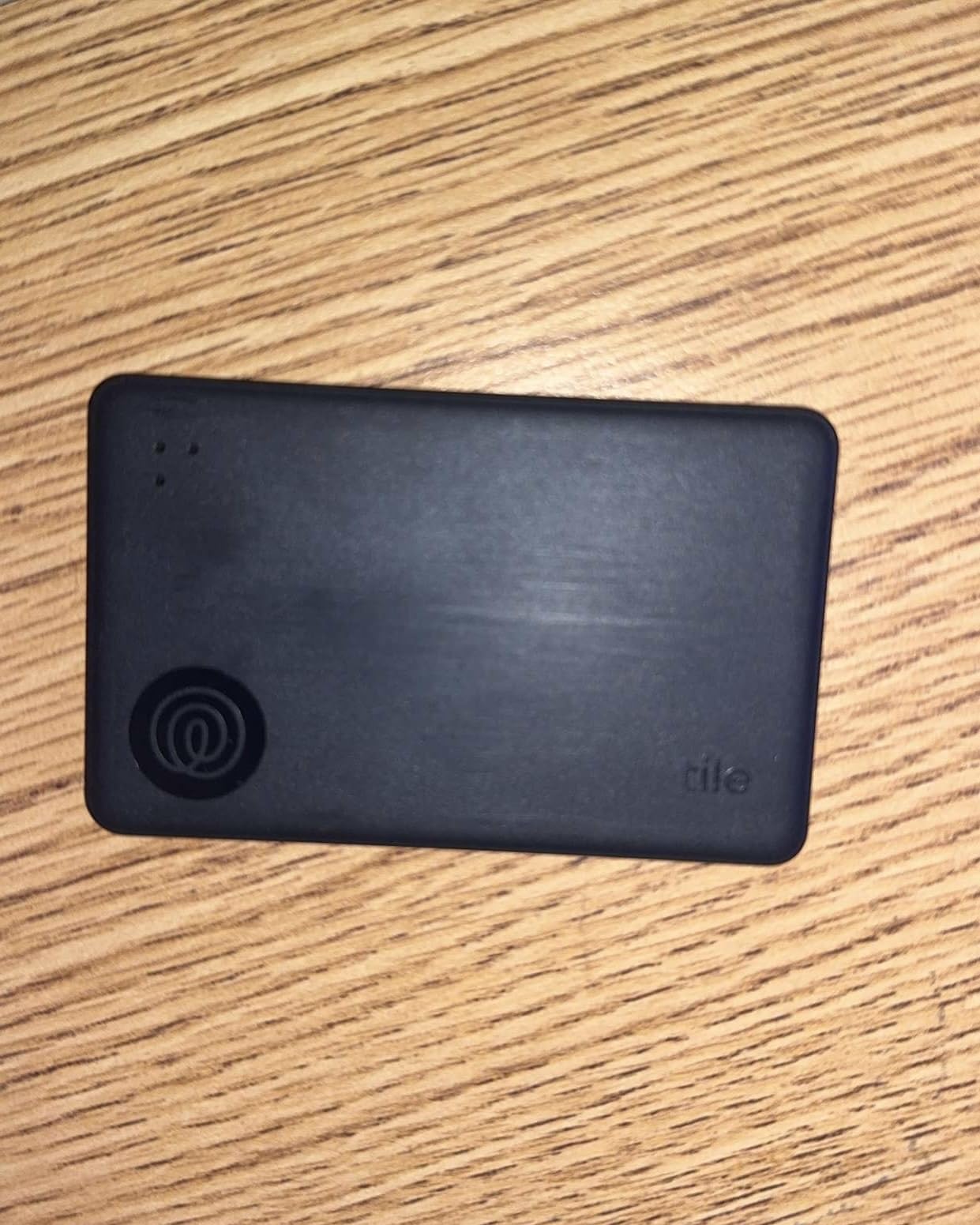 Life360 Tile Slim - Wallet Finder, Bluetooth Tracker and Item Locator for Luggage Tags, Passports and More. Both iOS and Android Compatible. Phone Finder. 1-Pack (Black) customer photo 1