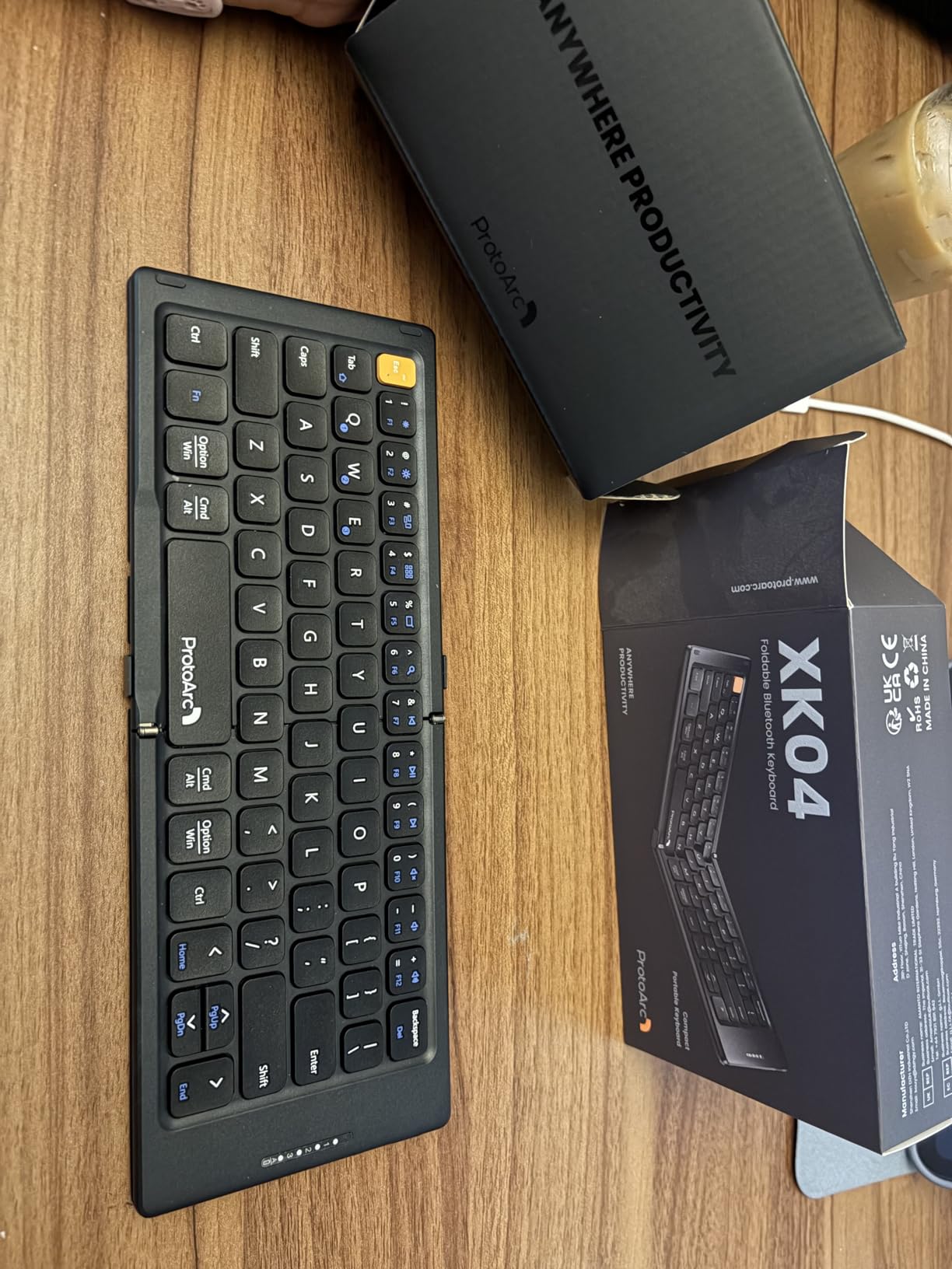 ProtoArc XK04 Foldable Compact Keyboard for Phone and Tablet, Black | Pocket-Sized, PU Leather Cover, Bluetooth 3-Device Workflow, for Business Travelers, On-the-go Typing customer photo 2