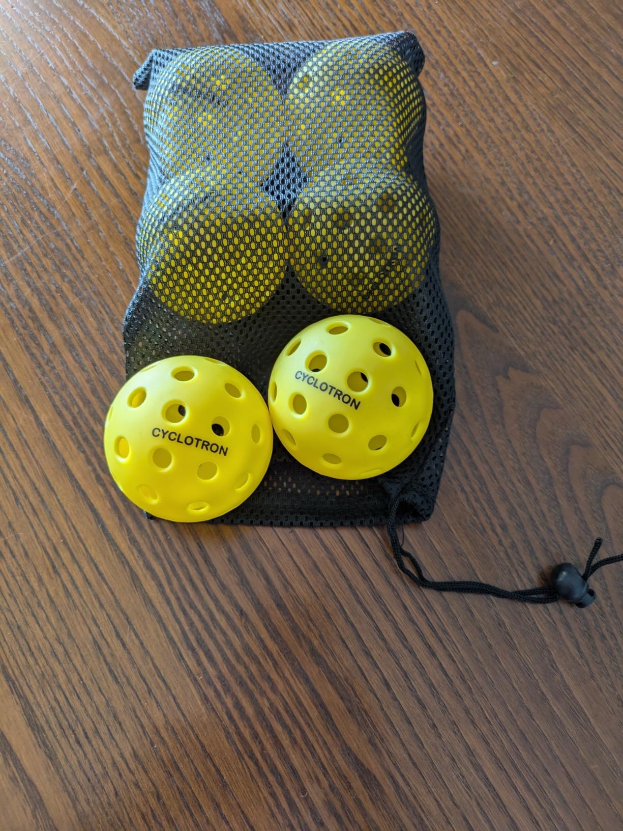 cyclotron 6-Pack Pickleball Balls - USAPA Approved, 40-Hole Outdoor & Indoor Pickleballs with Mesh Bag, High-Visibility Durable Balls for Practice customer photo 1