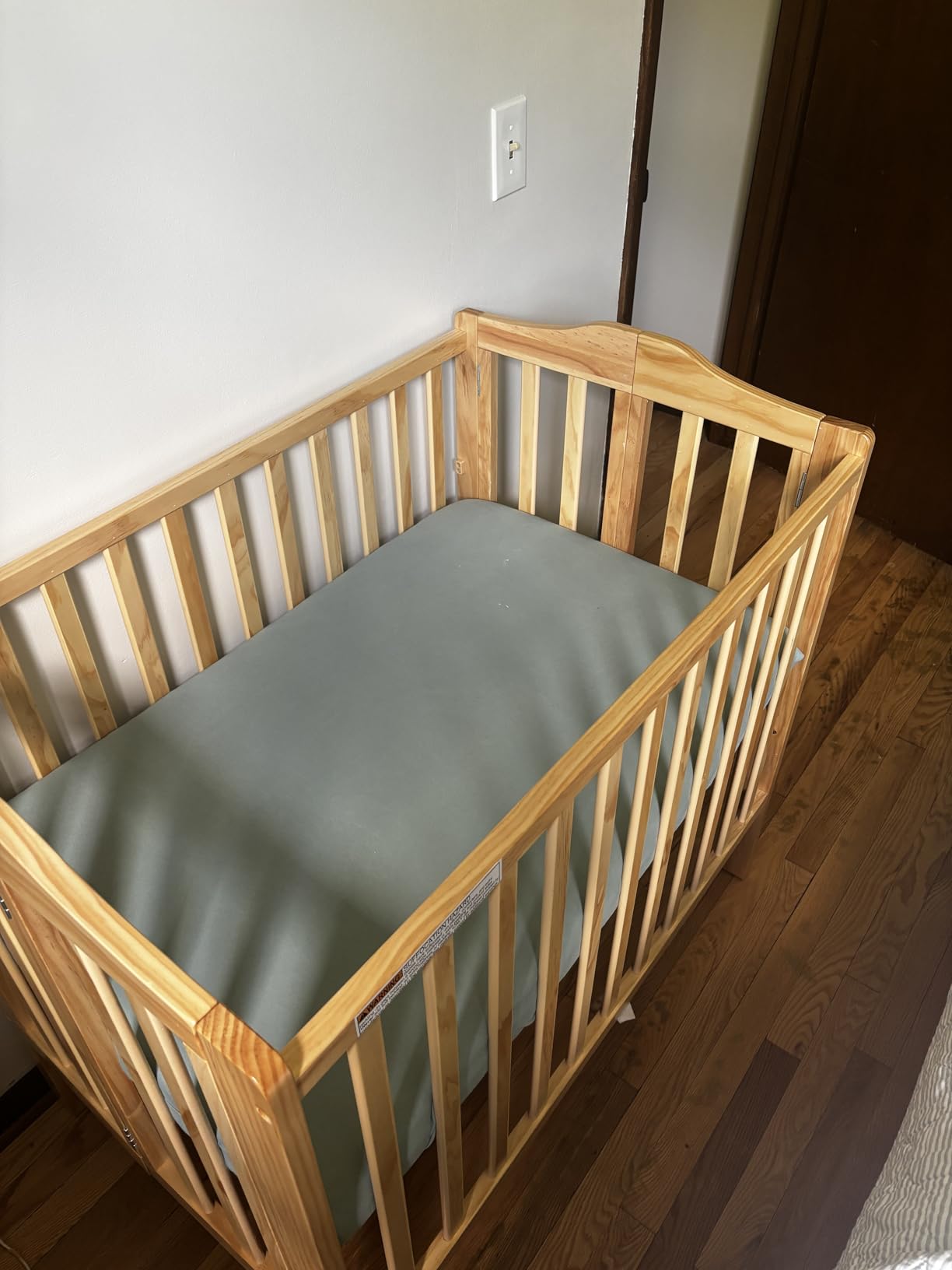 Delta Children Folding Portable Mini Baby Crib with 1.5-inch Mattress - Greenguard Gold Certified, Grey customer photo 1